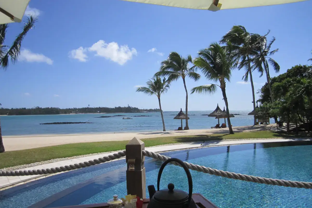 Mauritius tour package offering a full-day 5-island trip to explore Blue Bay Marine Park and relax at Ile aux Flamants Beach.